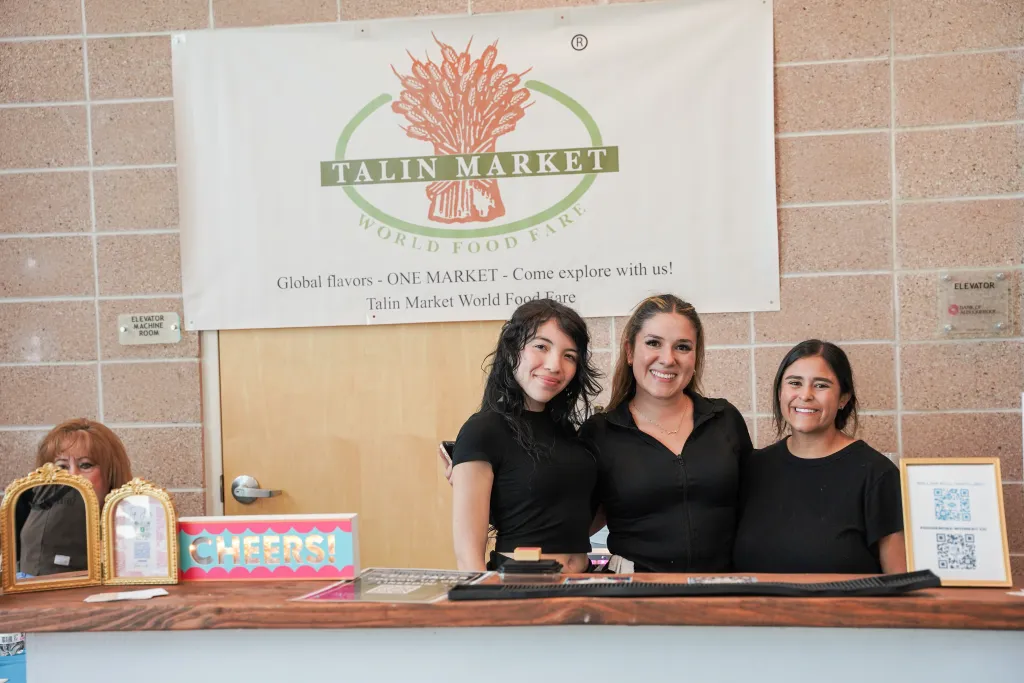 Vendor staff at the Talin Market World Food Fare table at Desert Dev Lab 2026